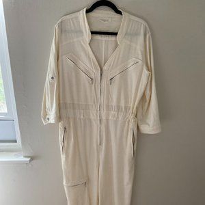 Cream jumpsuit with silver hardware from Anthropologie